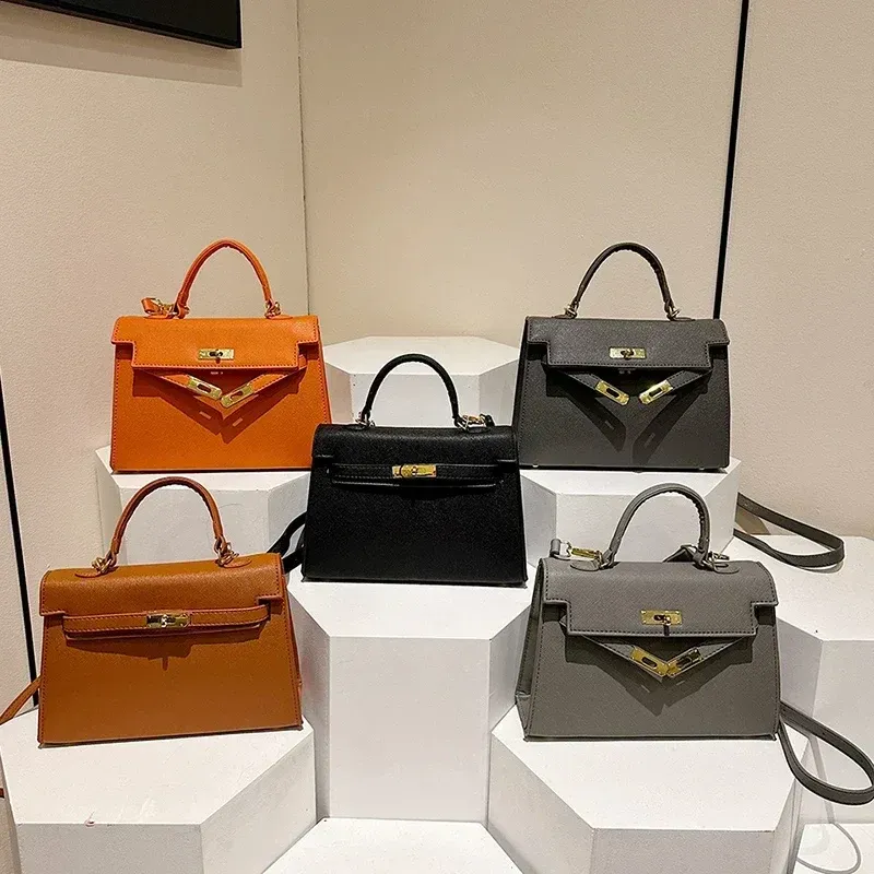 Luxury Leather Mini Bag Structured Orange Design With Gold Hardware - Product example