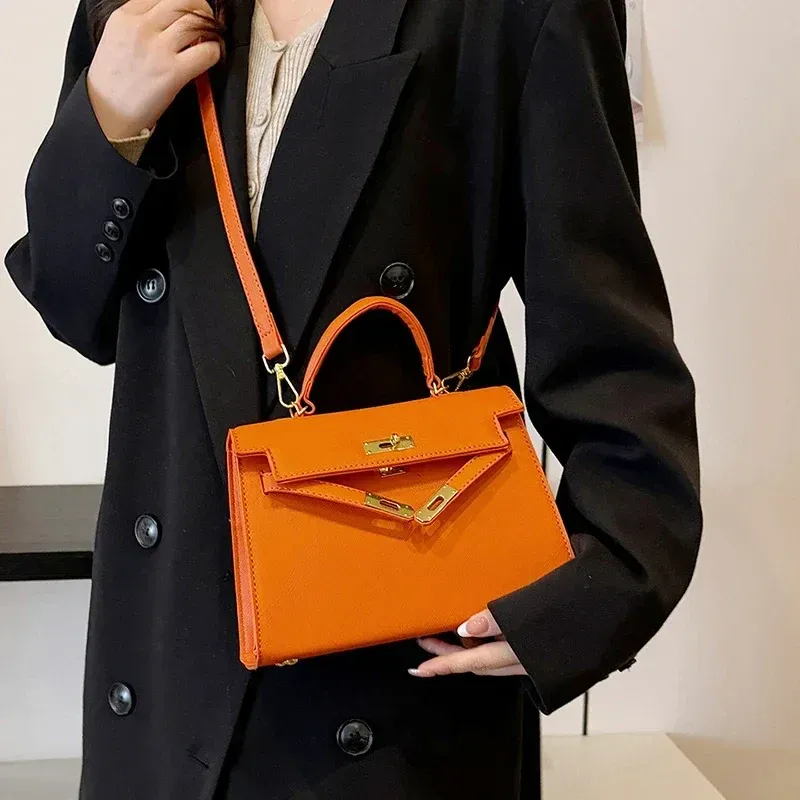 Luxury Leather Mini Bag Structured Orange Design With Gold Hardware - Product showcase