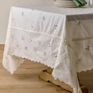 Antique White Eyelet Tablecloth shown on table
