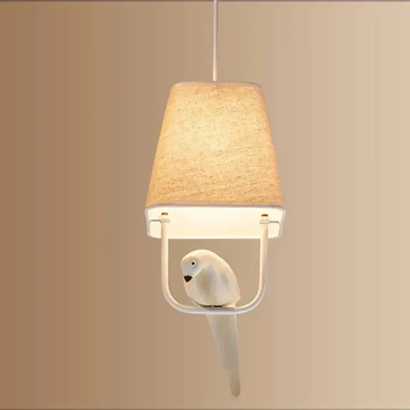 Scandinavian Rattan Pendant Light Bird Perch Design with Warm Glow - Product showcase