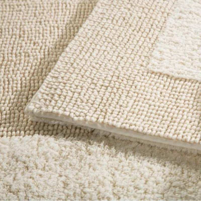 Hochwertige Badezimmermatte aus Baumwolle in Naturtönen von Select Rhomyhome.